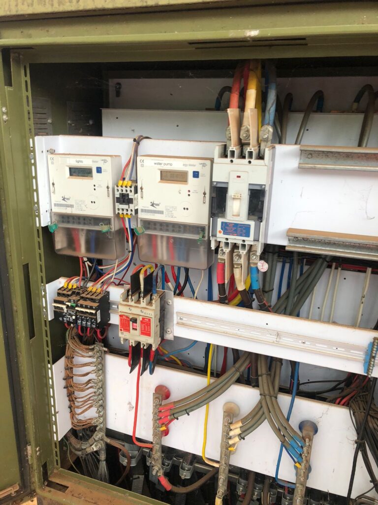 Electrical distribution board with meters and circuit protection